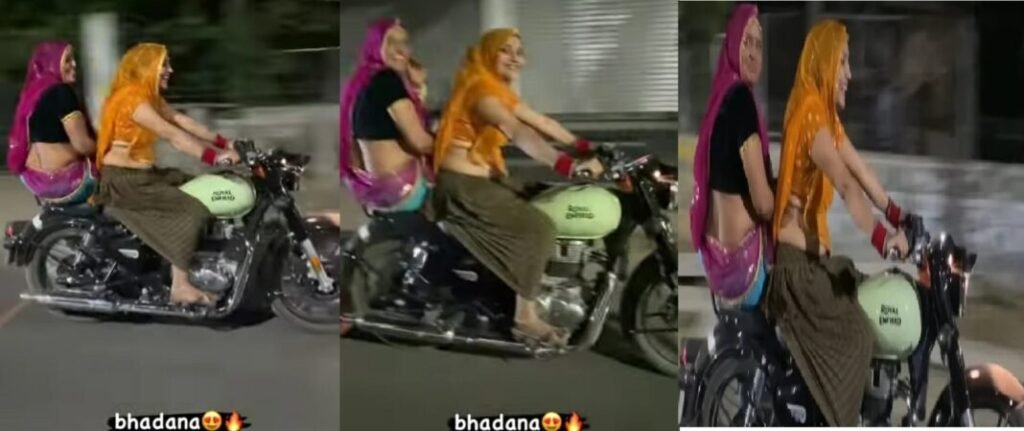 लहंगा पहने हल्के घूंघट और जानदार मुस्कान में सड़क पर Bullet दौड़ा रहीं भाभी बुलेट की स्पीड देखकर लोग हुए भौचक्के देखे वीडियो